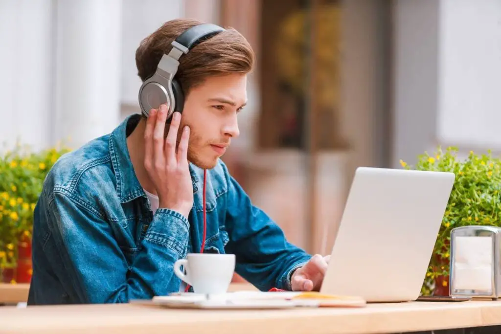 How To Hear Yourself in Headphones (3 Ways)