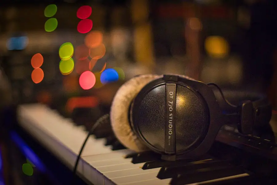 black sony headphones on piano keys